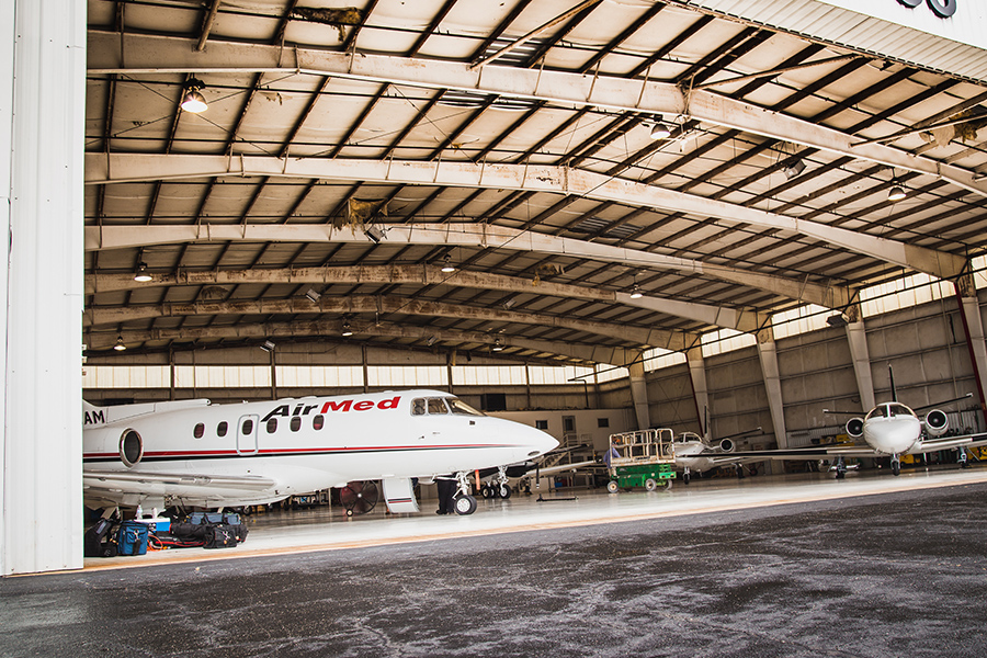 AirMed jet at hangar for non-emergency services